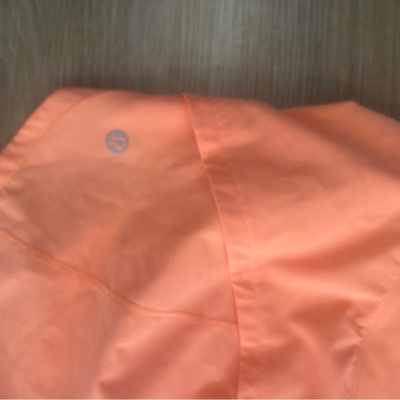 Lululemon orange shorts, size 4-6. Never worn. - Picture 3 of 4